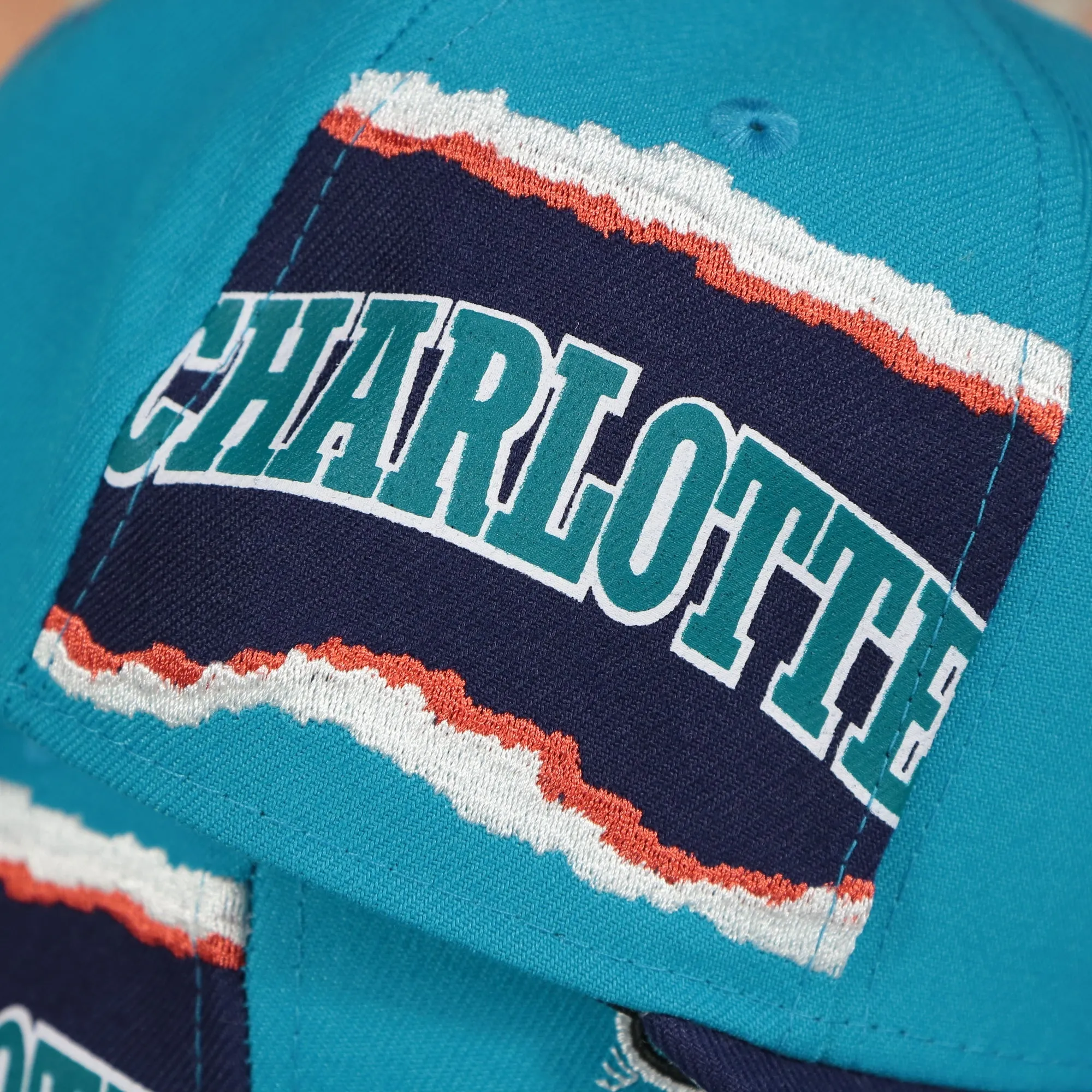 Charlotte Hornets Hardwood Classics Jumbotron Charlotte Ripped Wordmark side patch Grey Bottom Teal/Purple Snapback hat | Mitche