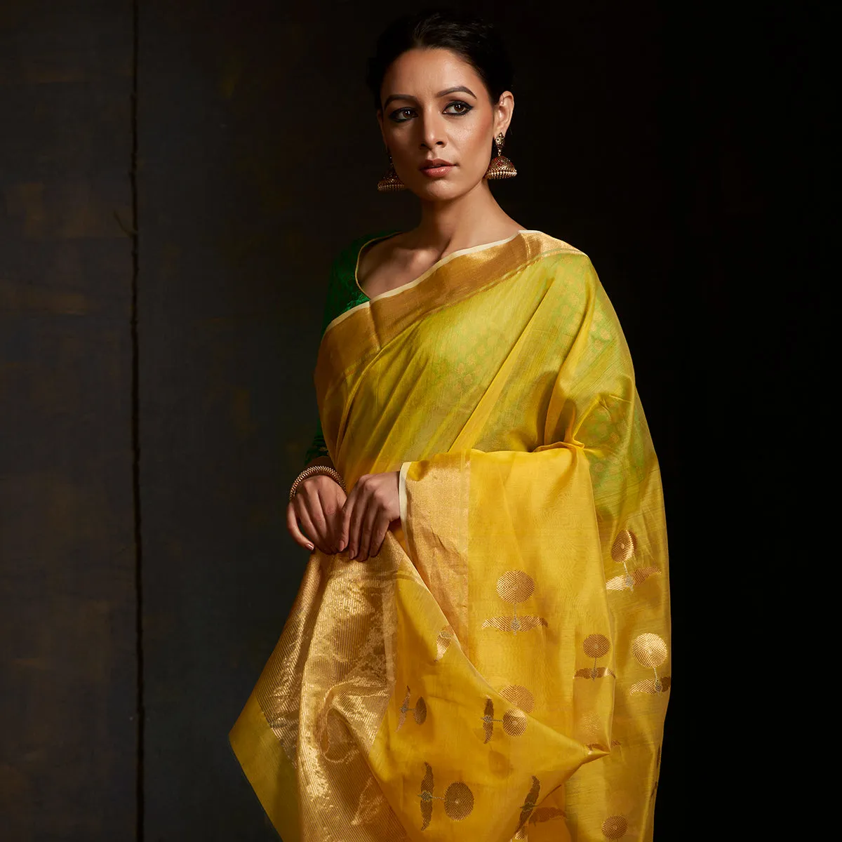 Handwoven yellow chanderi saree with sunflower motif on the pallu