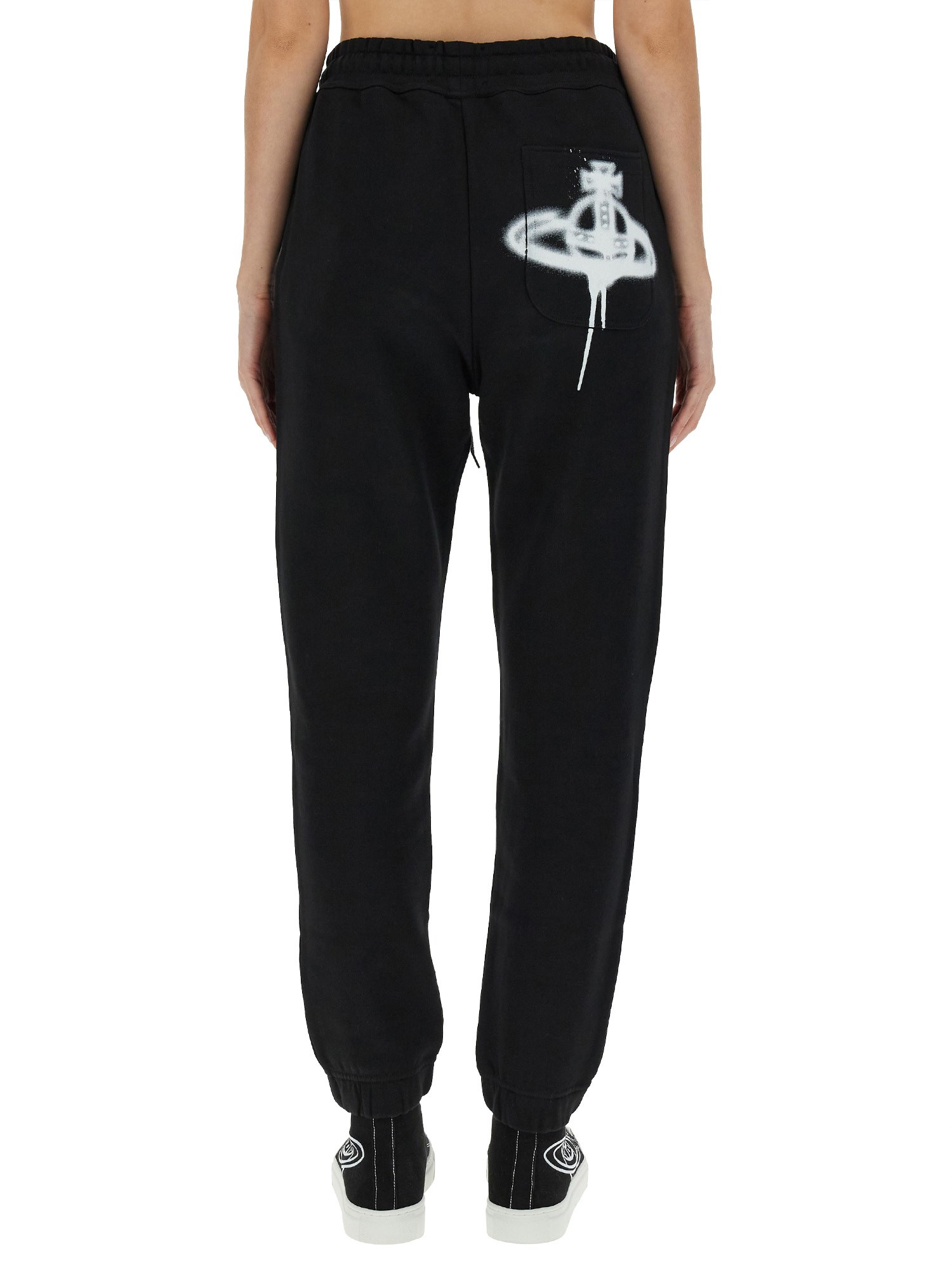 VIVIENNE WESTWOOD    COTTON JOGGING PANTS WITH SPRAY PRINT ORB