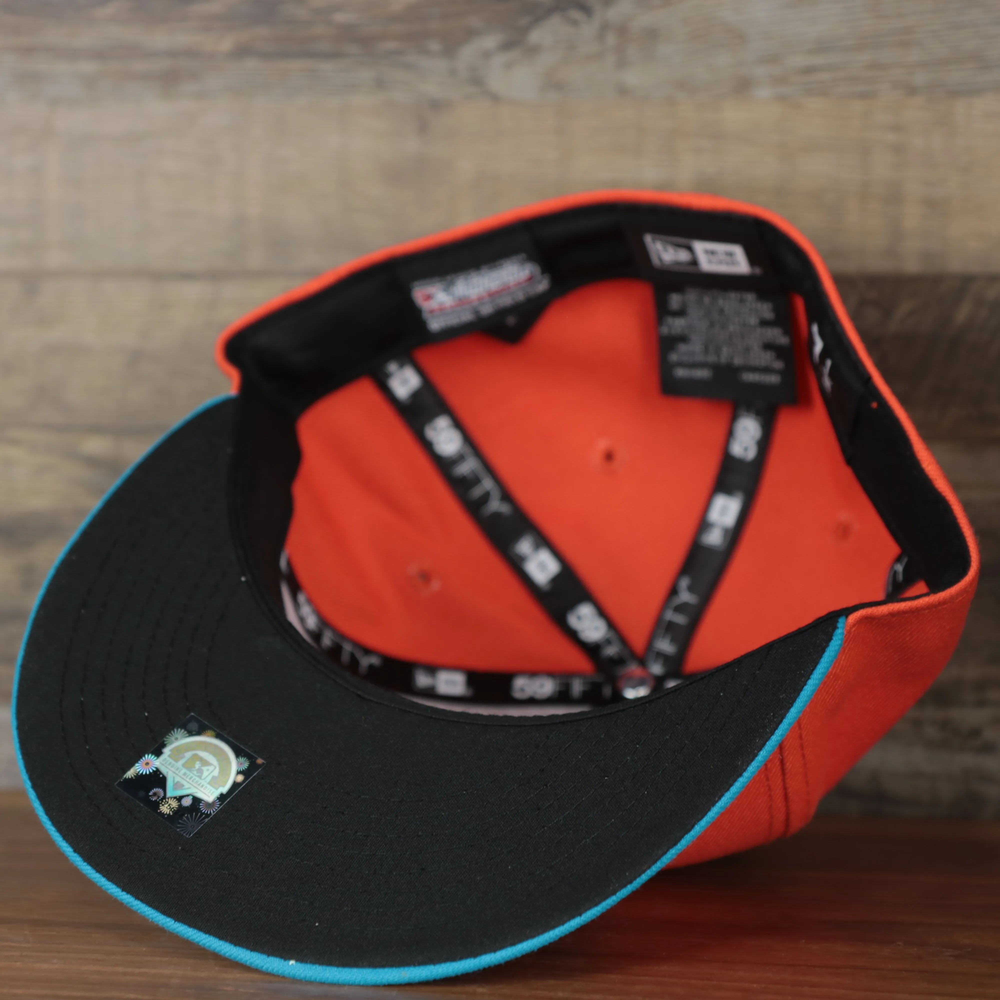 Wisconsin Timber Rattlers 2022 Cascabeles de Wisconsin Copa de la Diversion On-Field Black Bottom 5950 Fitted Cap | Orange